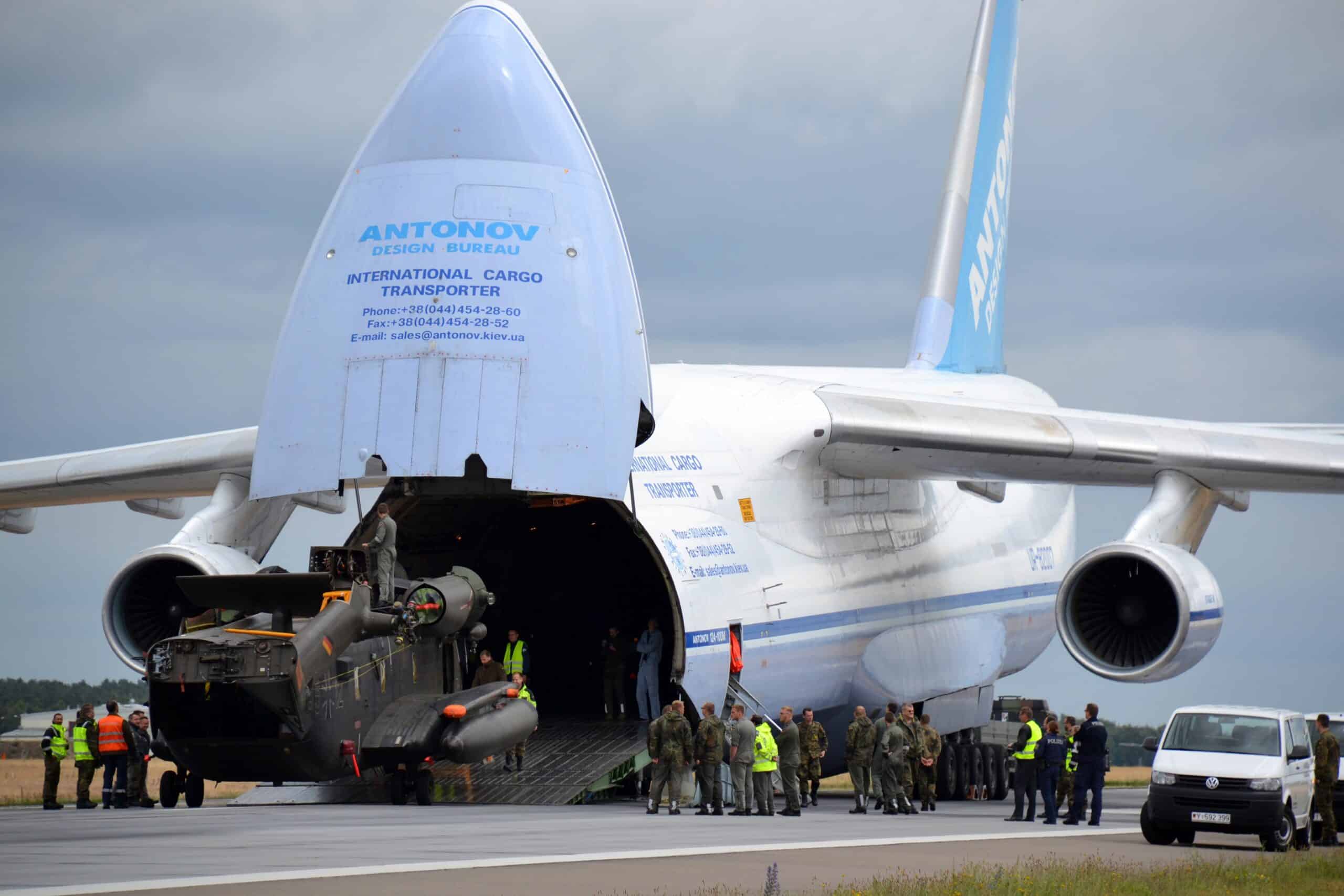 Unbelievable Feat: Extreme Cargo Plane Hauls Train, Helicopters, and ...