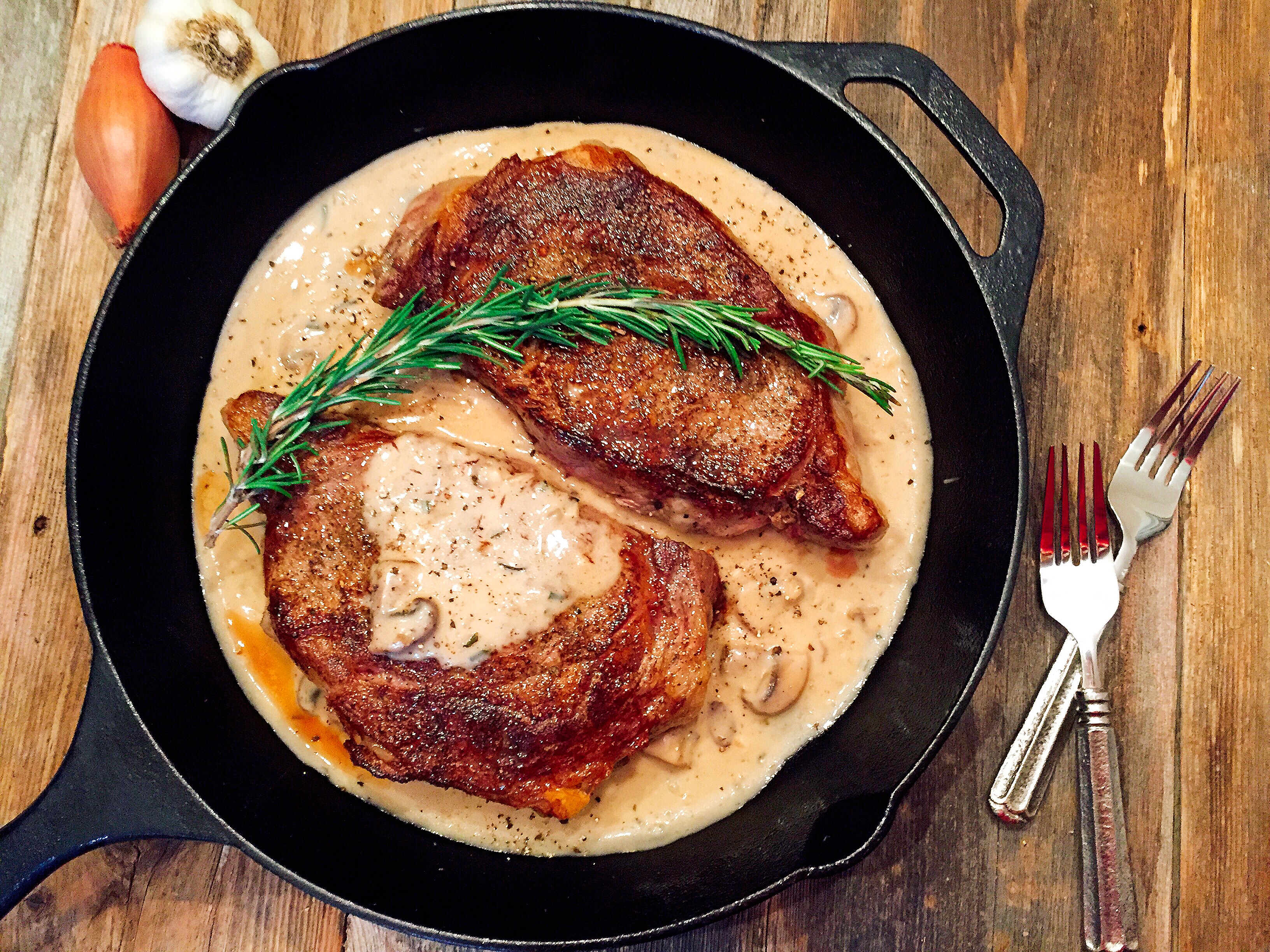 Pan-Seared Rib-Eye Steaks in a Brandy & Rosemary Cream Sauce