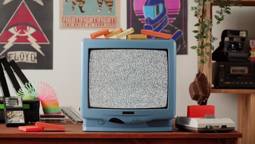 Old television with gray screen at home. Close-up of vintage tv in living room, nostalgia. Searching channel, bad signal. 