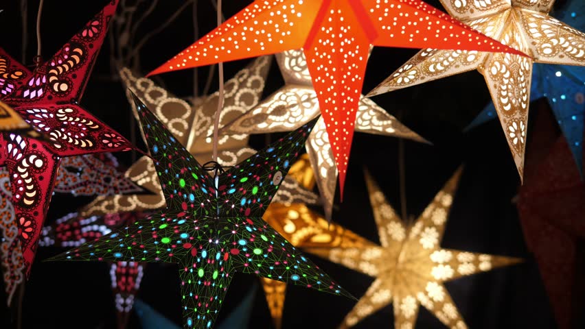 A variety of handmade Bethlehem stars at the Christmas market. The concept of New Year's decor.