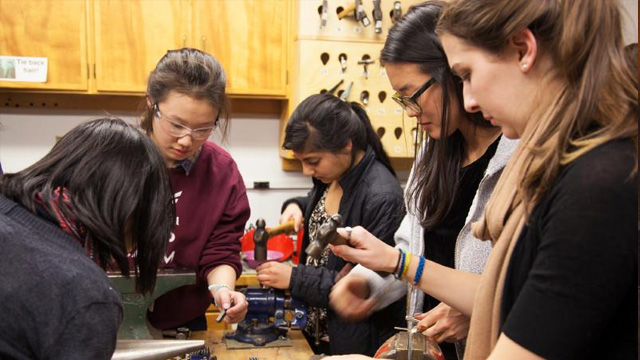 Five students working at a Hopkins Center workshop