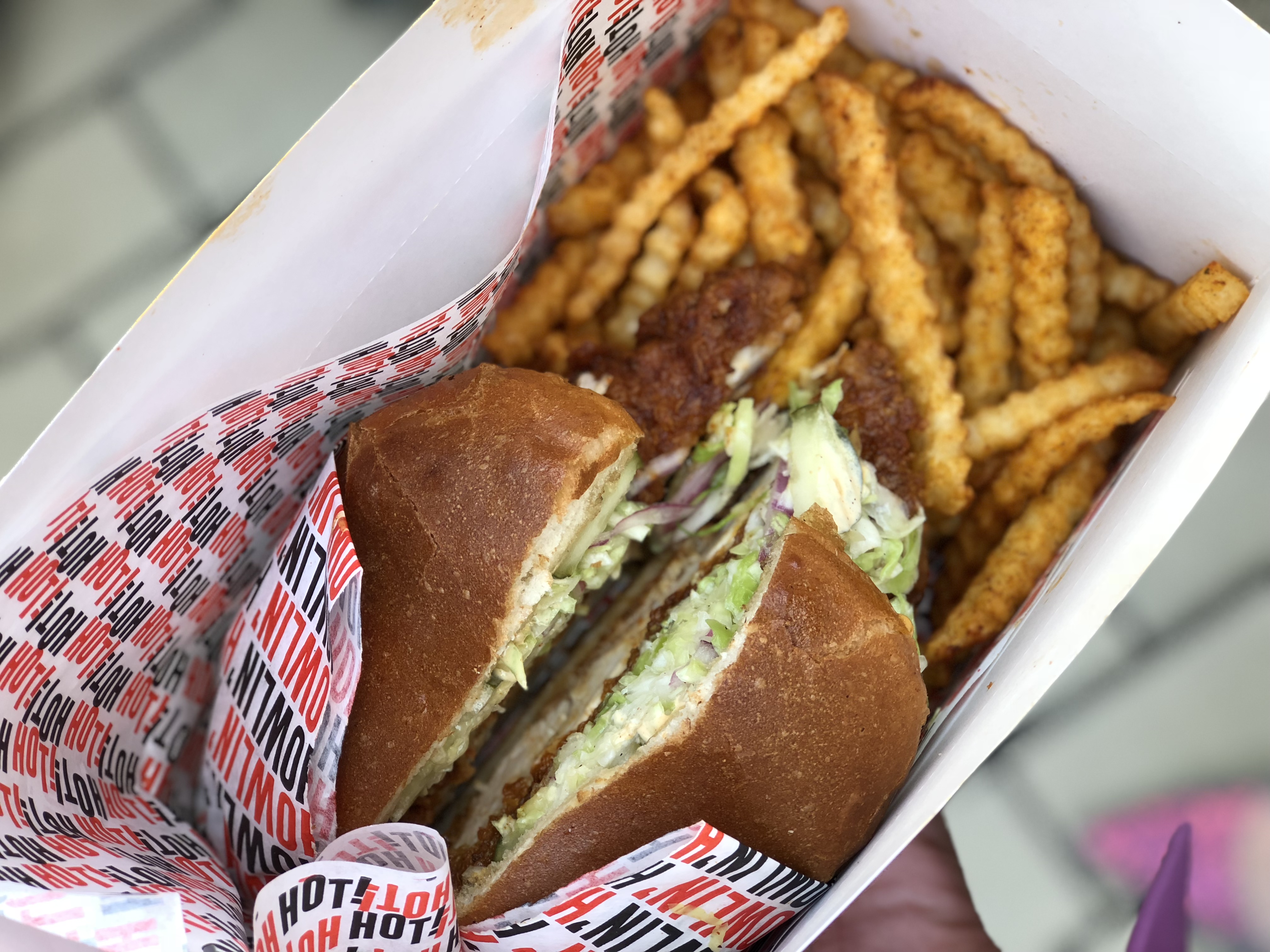 Howlin Ray's chicken sandwich with fries