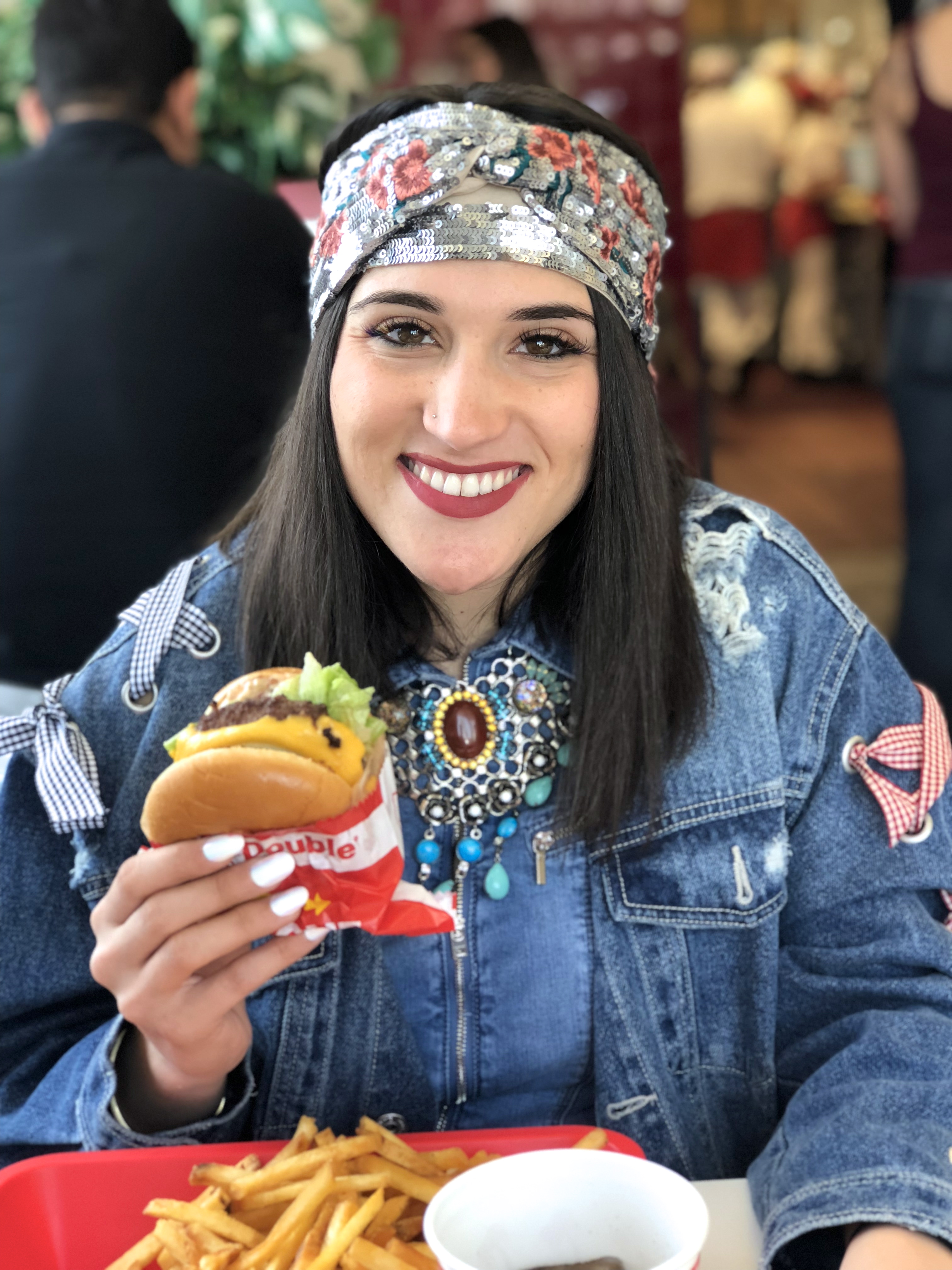 Aya eating In-and-Out burger