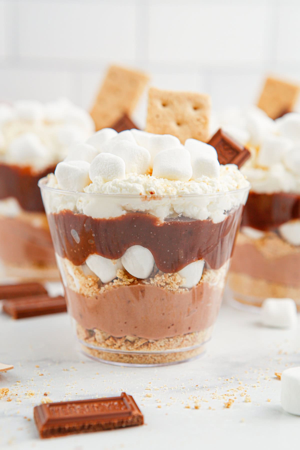 Layers of pudding, marshmallow, whipped topping, and graham crackers.