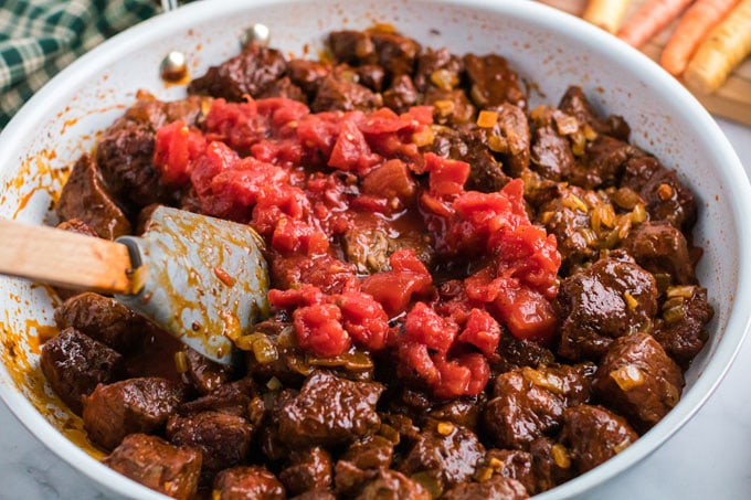 tomatoes added to the skillet