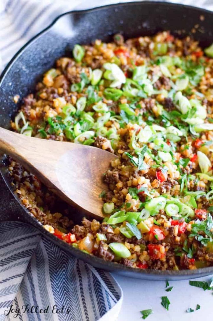 Keto dirty cauliflower rice with venison in a skillet