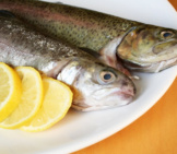 Sprat Fish With Lemonphoto By: (C) Orson Www.fotosearch.com