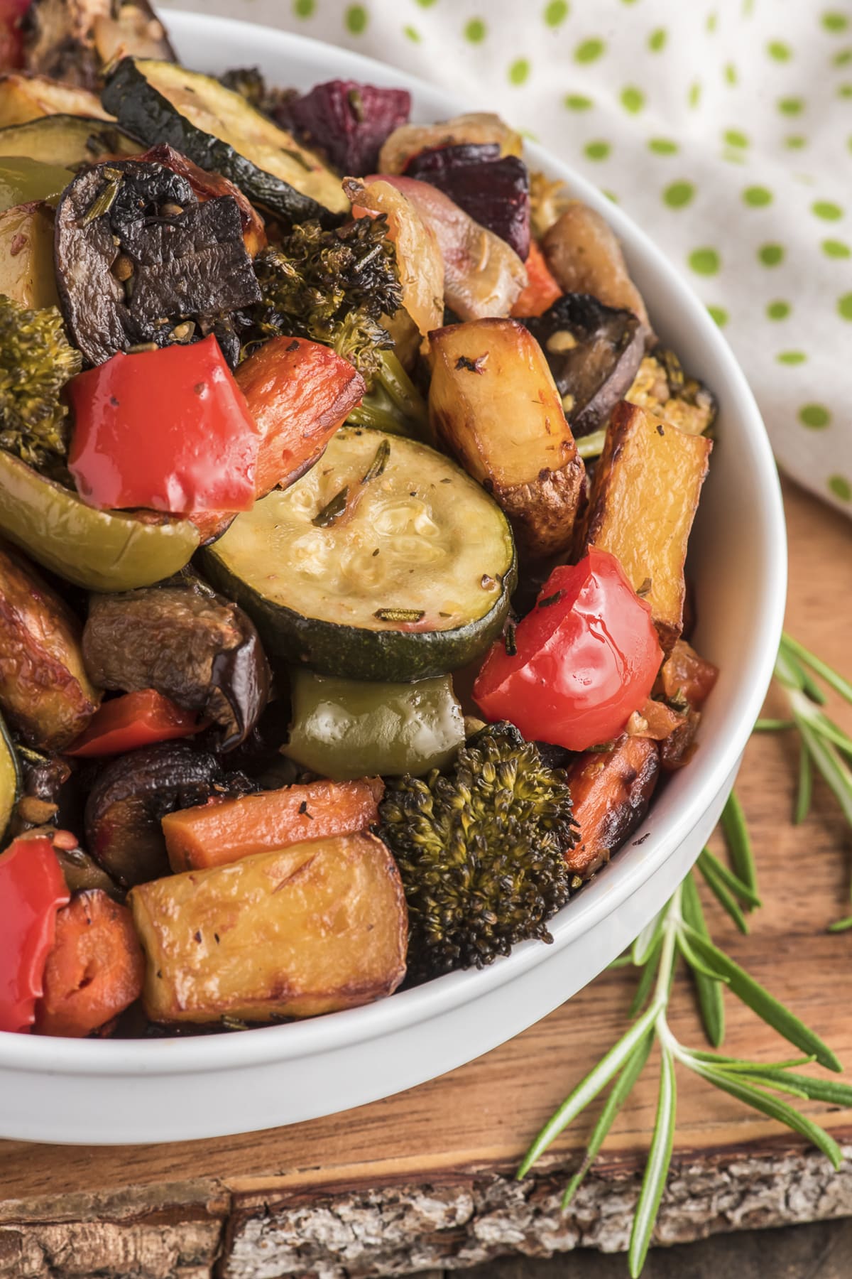 Roasted vegetables in a white bowl.