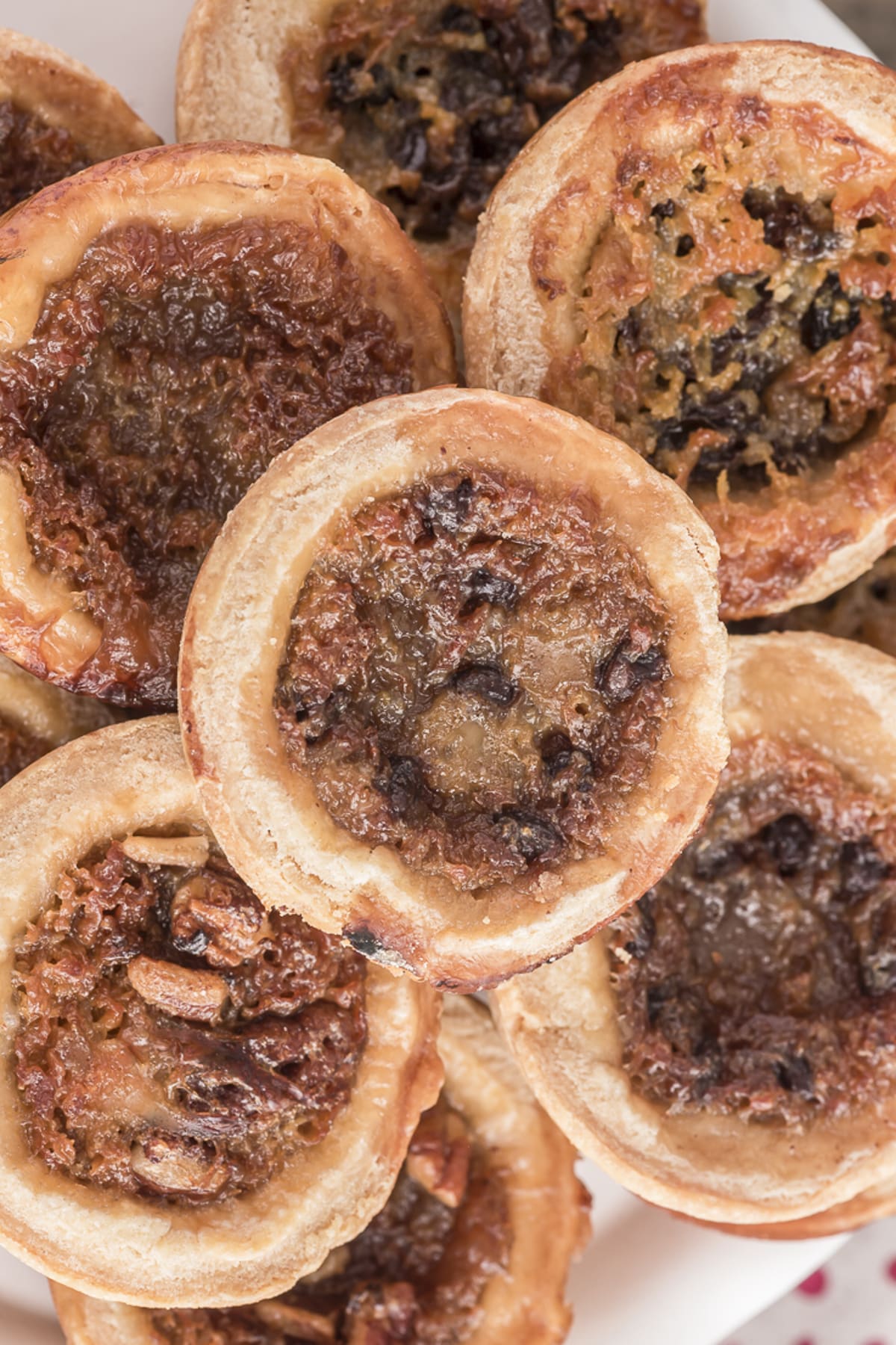 Butter tarts on a wire rack.