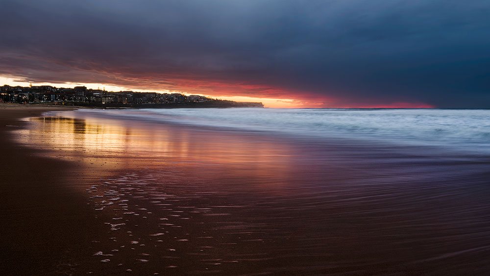 coastal sunrise water trails