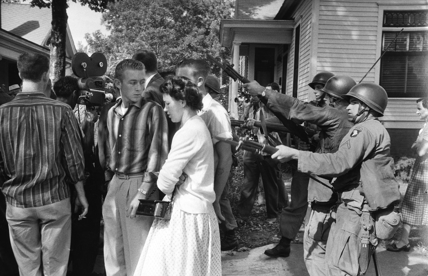 Segregationists rousted from an anti-integration protest, Little Rock, Arkansas, 1957.