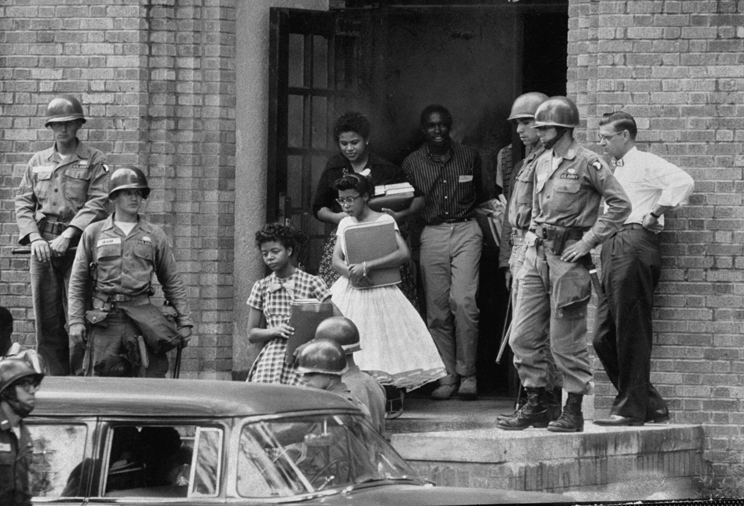 African-American students escorted by federal troops, Little Rock Central High School, 1957.