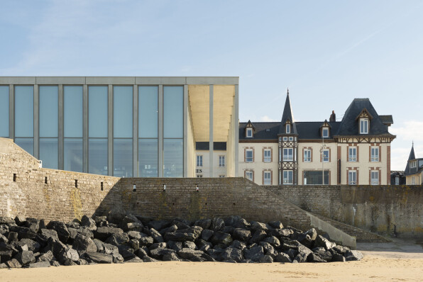 The D-Day Museum by Projectiles is a building rooted in the Normandy coastline