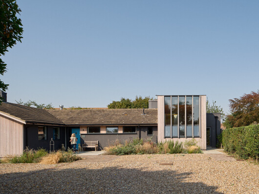 Mole Architects elevates “mundane” 1960s English bungalow with new extension