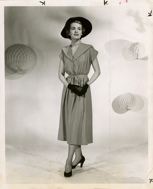 Salt Lake Tribune file photo

A model poses in a dress in this fashion photo from The Salt Lake Tribune archives. The photo is dated from 1950.