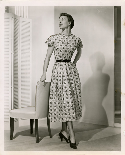 Salt Lake Tribune file photo

A model poses in a dress in this fashion photo from The Salt Lake Tribune archives. The photo is dated from 1950.