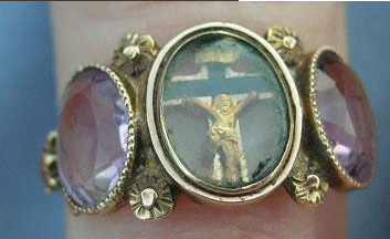 Faith, hope, charity ring depicting crucified Jesus