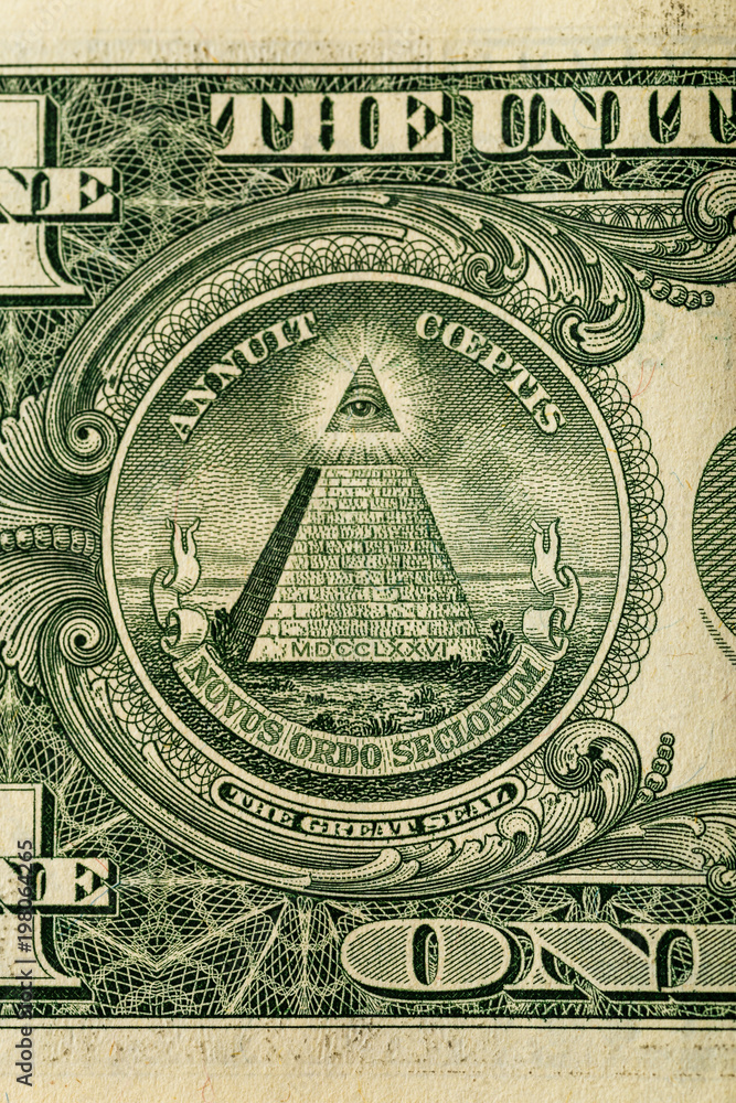 Conspiracy theory concept. All Seeing Eye and Pyramid on USA dollar banknote