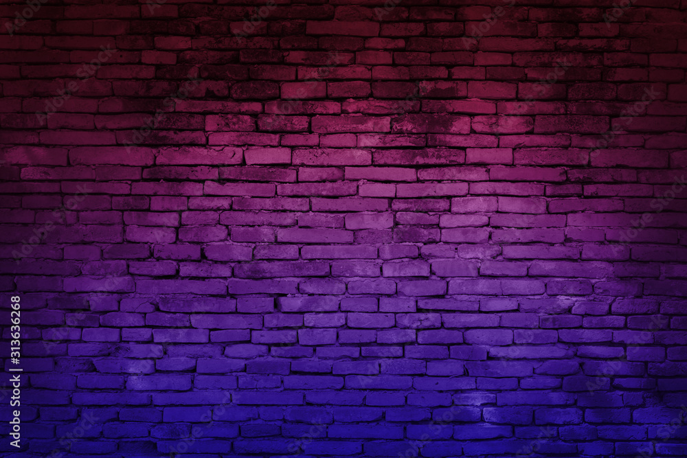 Neon light on brick walls that are not plastered background and texture. Lighting effect red and blue neon background of empty brick basement wall.