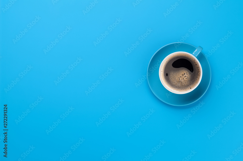 Blue coffee cup over blue background