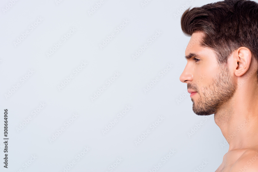 Closeup profile photo of macho model guy perfect neat hairstyle looking empty space focused salon spa refreshment procedures naked torso isolated grey background