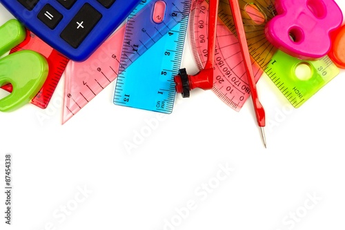 Foto Border of school supplies with math theme on a white background