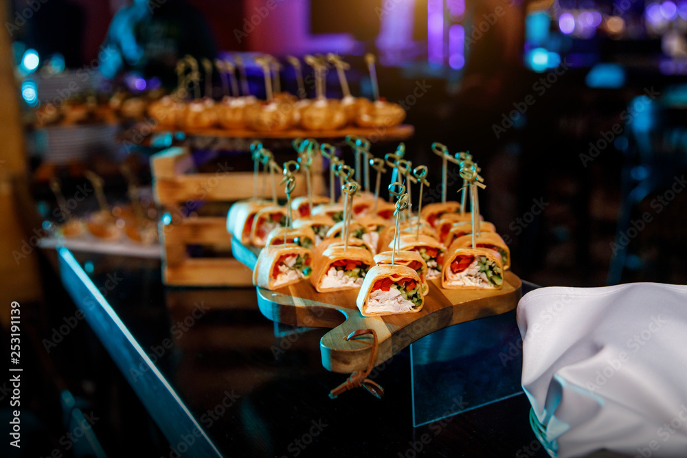 catering services background with snacks on guests table in restaurant  Stock Photo | Adobe Stock