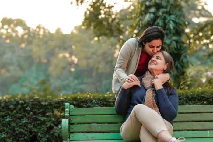 Mum and daughter on a bench in a park