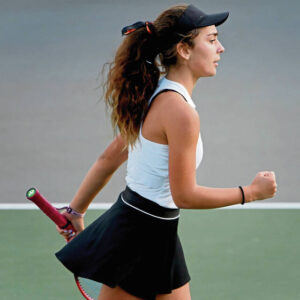 Bethel Park’s Cami Fisher pumps her fist after winning her match against North Allegheny during the 2023 WPIAL Class 3A team tennis championship.