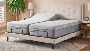 A split king mattress on an adjustable base with one side in an elevated postion