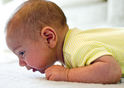 Young baby lifting head