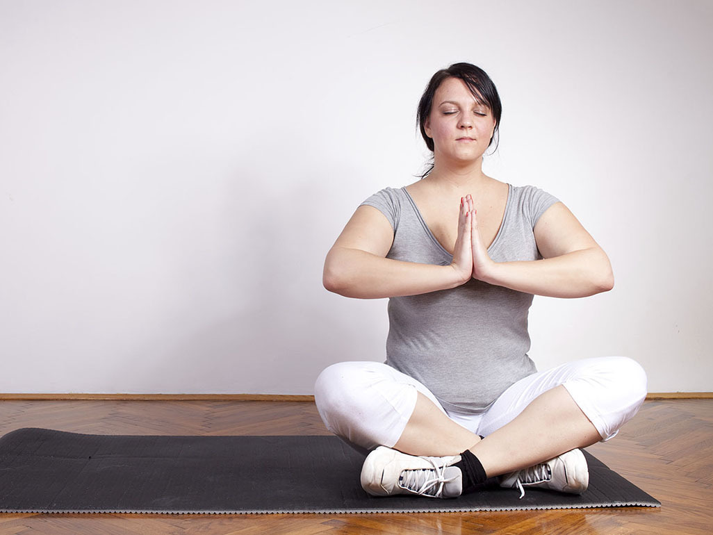 Pregnant woman meditating