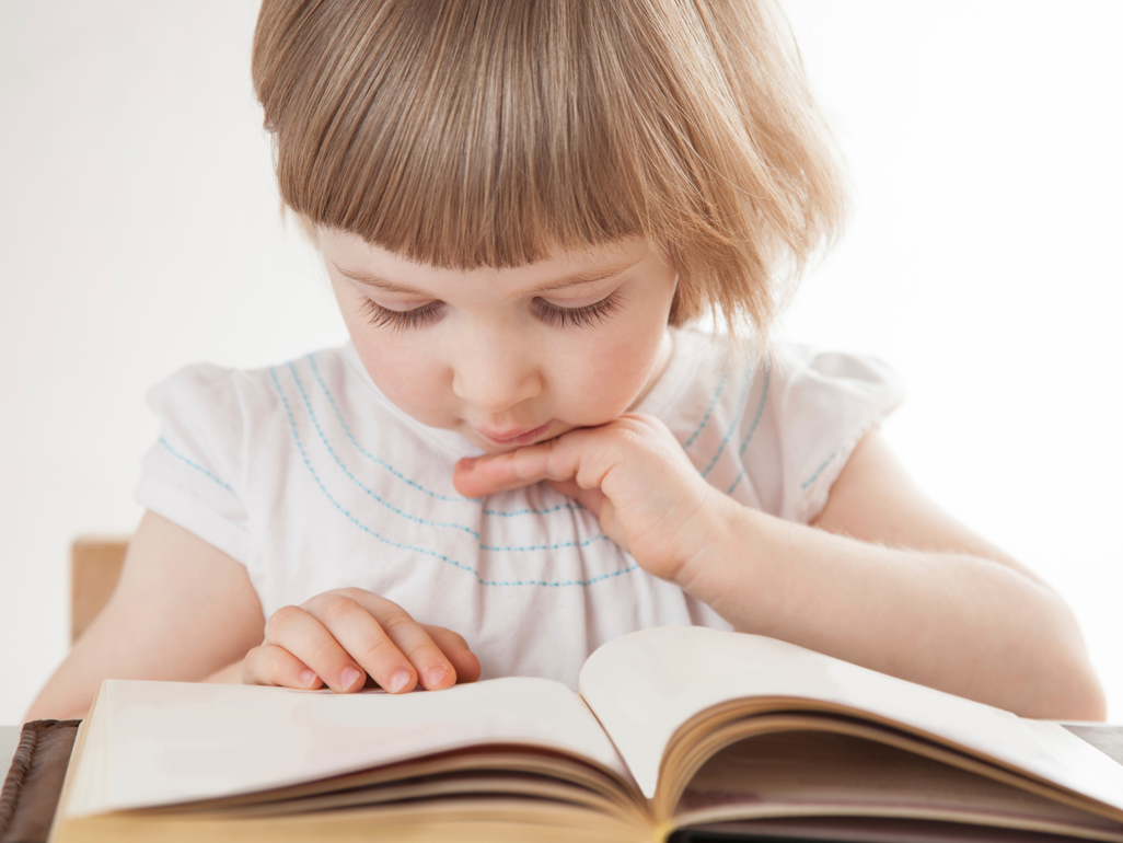 child reading a book