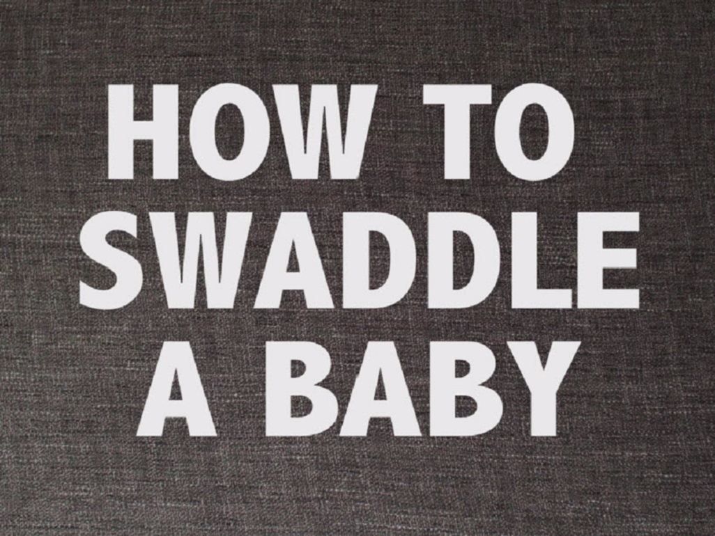 title card with text: How to swaddle a baby