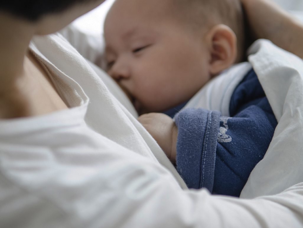 Mum breastfeeding baby