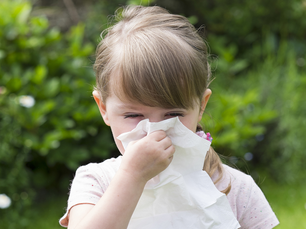 Child blowing nose