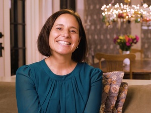 woman on couch talking