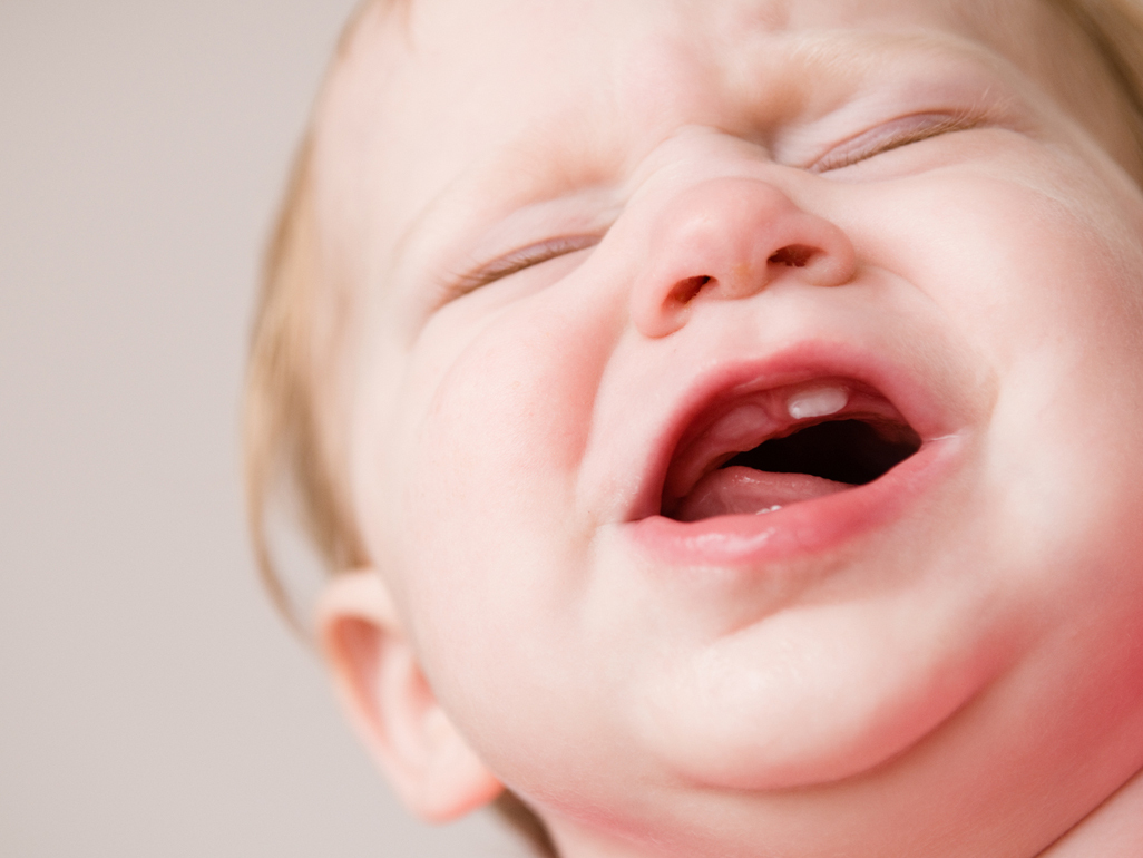 Baby crying with teething pain