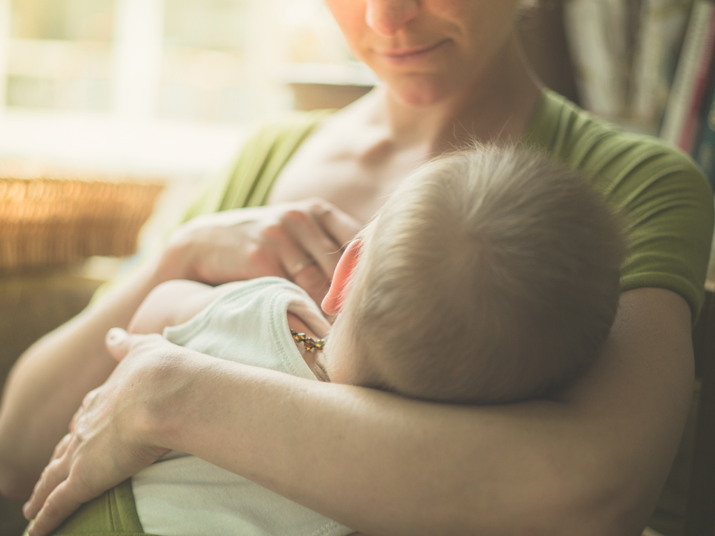 Mum breastfeeding baby