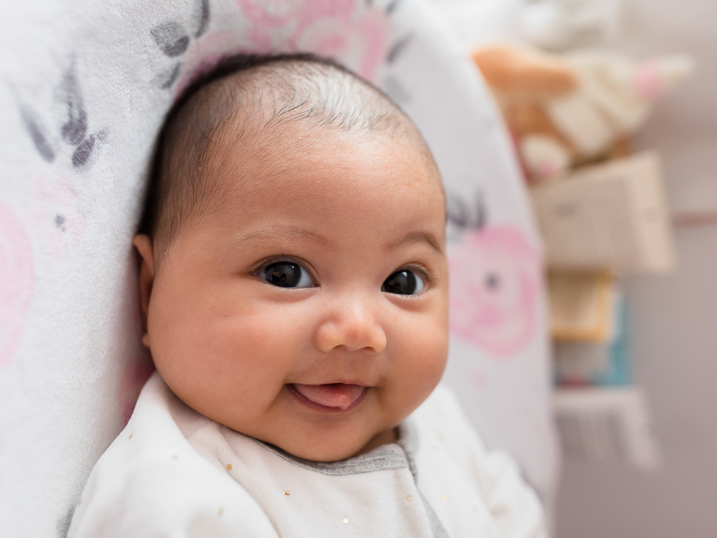 cute baby with brown eyes looking at camera