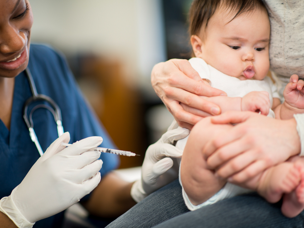 Baby being immunized