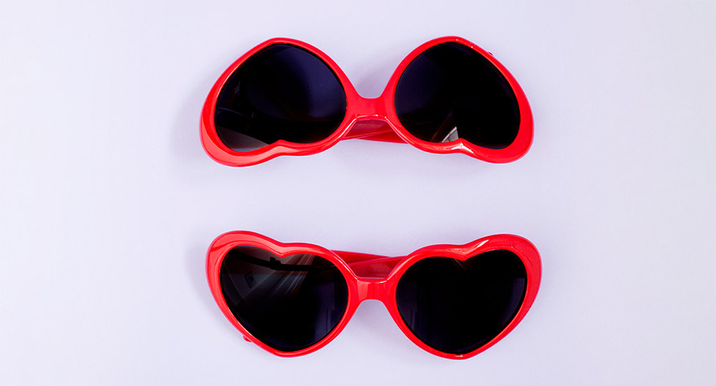 2 pairs of heart-shaped sunglasses