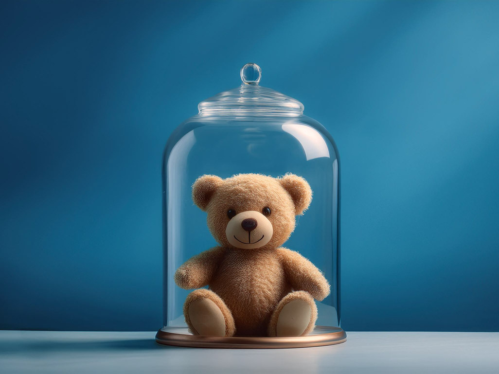 teddy bear inside a glass jar