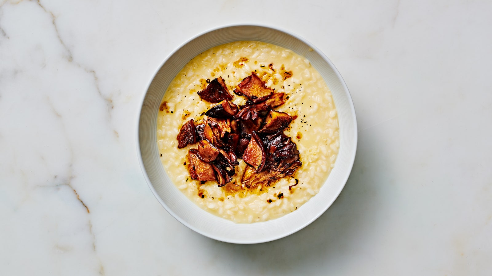 Bowl of BA's Best Risotto with mushrooms and thyme.