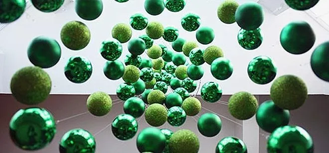 Spiral of green decorative spheres.