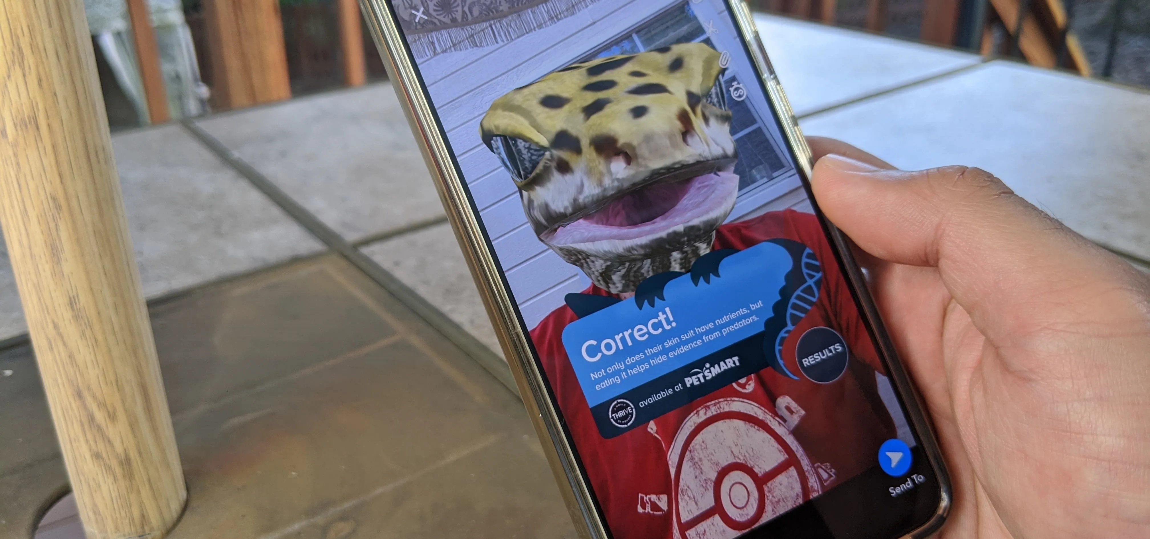 Image of a smartphone displaying a cartoon character with a spotted design, holding a sign that says "Connect."