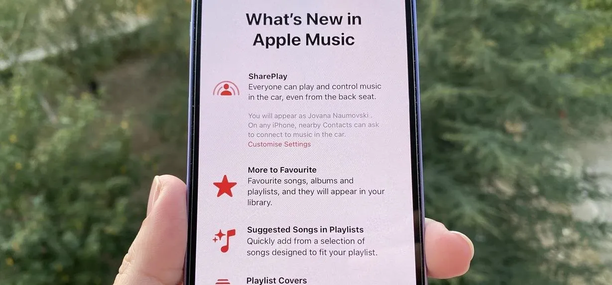 Apple Music app update features displayed on a smartphone.