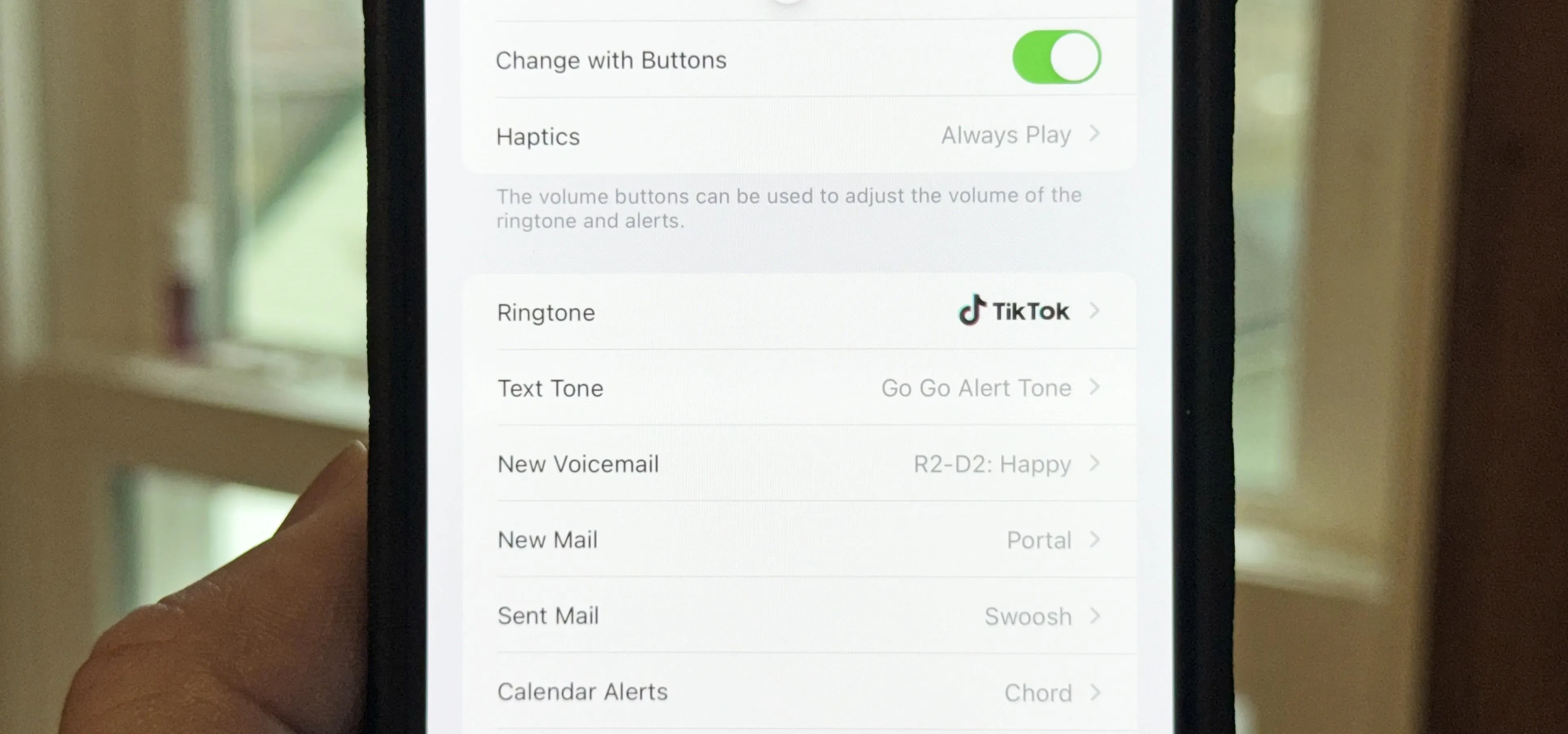 Mobile device settings menu with various options displayed.