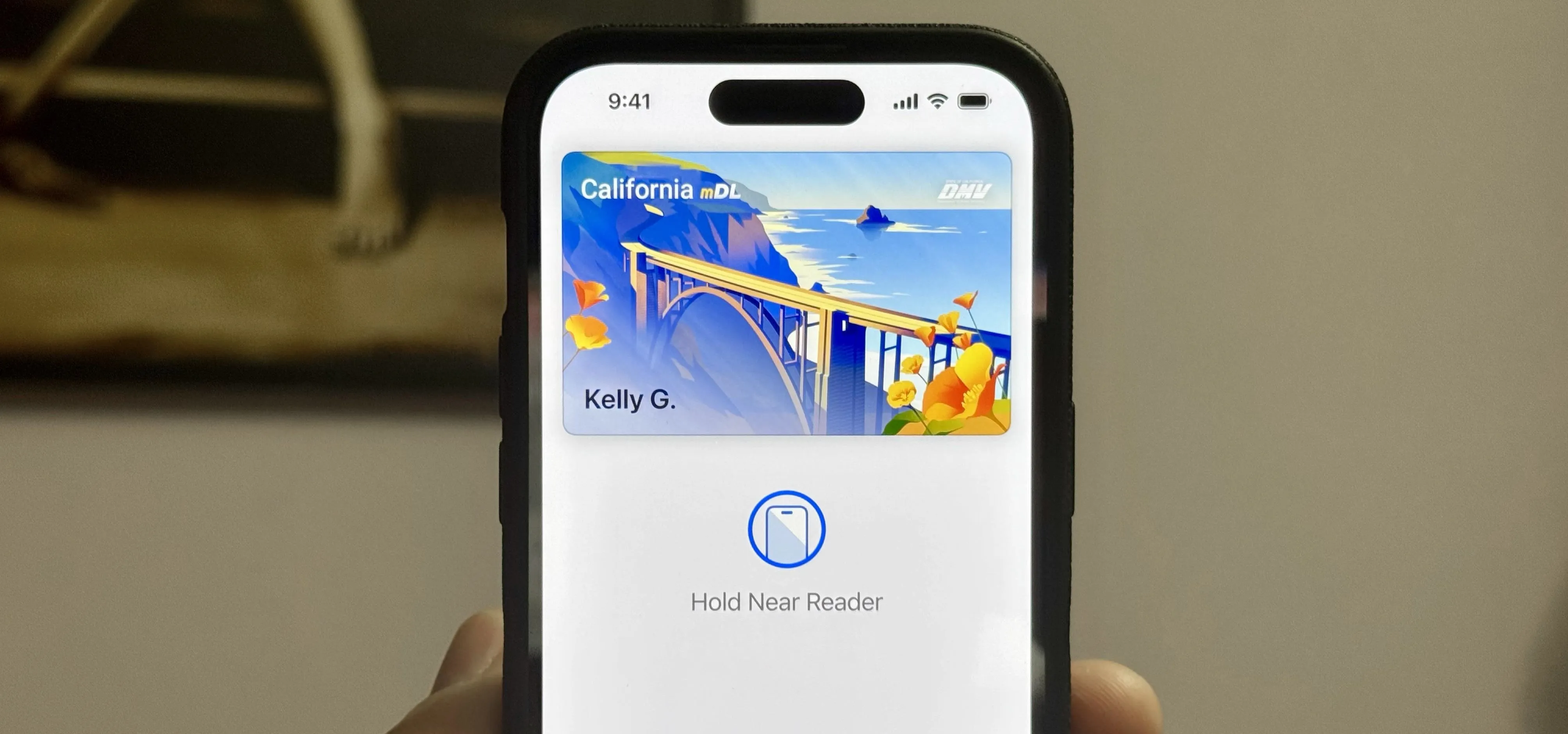 Digital wallet displaying a California identification card on a smartphone.