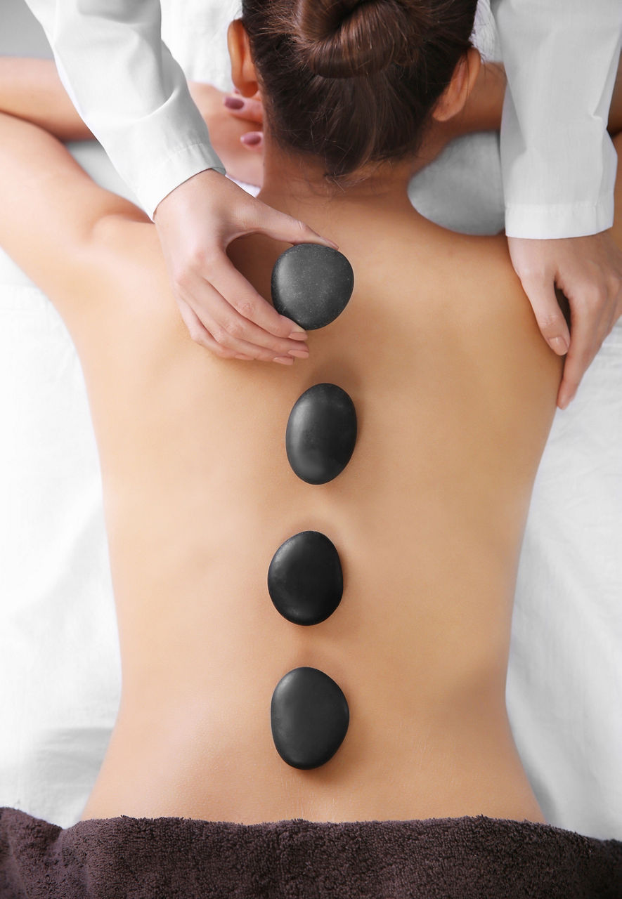 Woman Receiving a Spa Stone Massage 